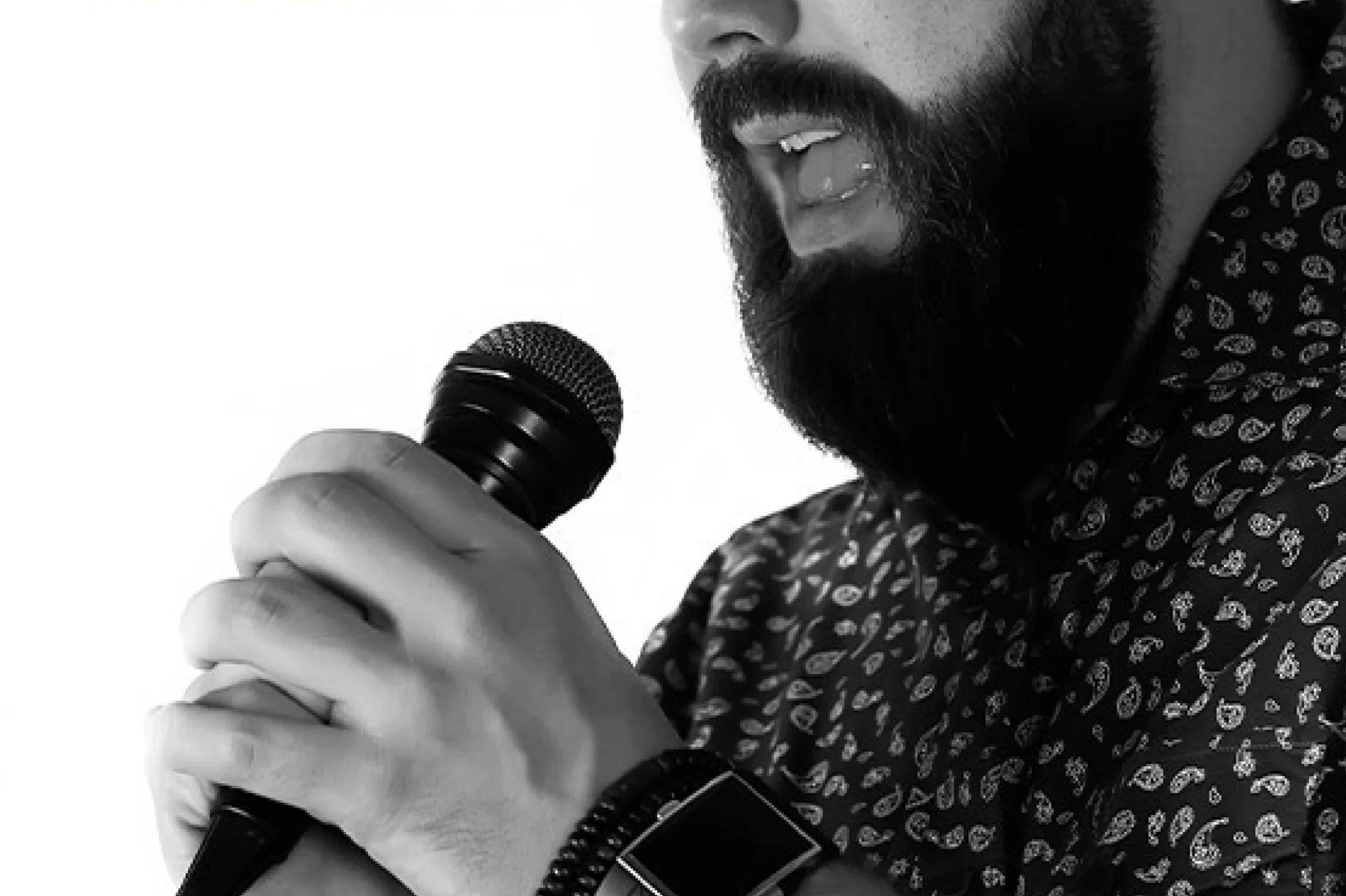 How do I develop my vocal range while singing Hindustani music